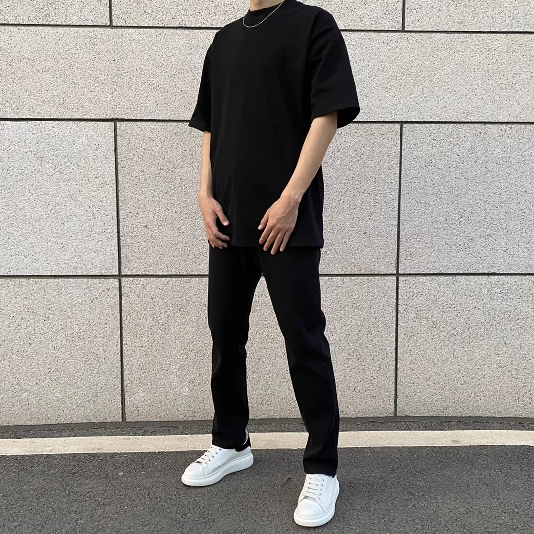 黑色弹力牛仔裤高街显瘦休闲长裤秋冬直筒水洗裤子男