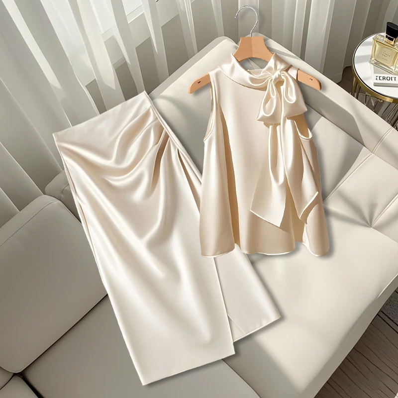 法式夏季新款减龄别致不规则上衣2025薄款显瘦中长半身裙两件套装