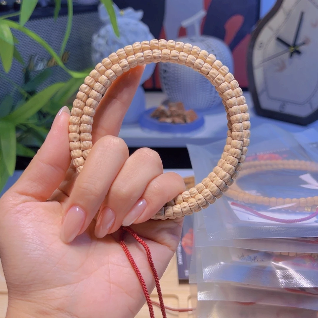 卢***牛柏香籽/百香籽吊坠