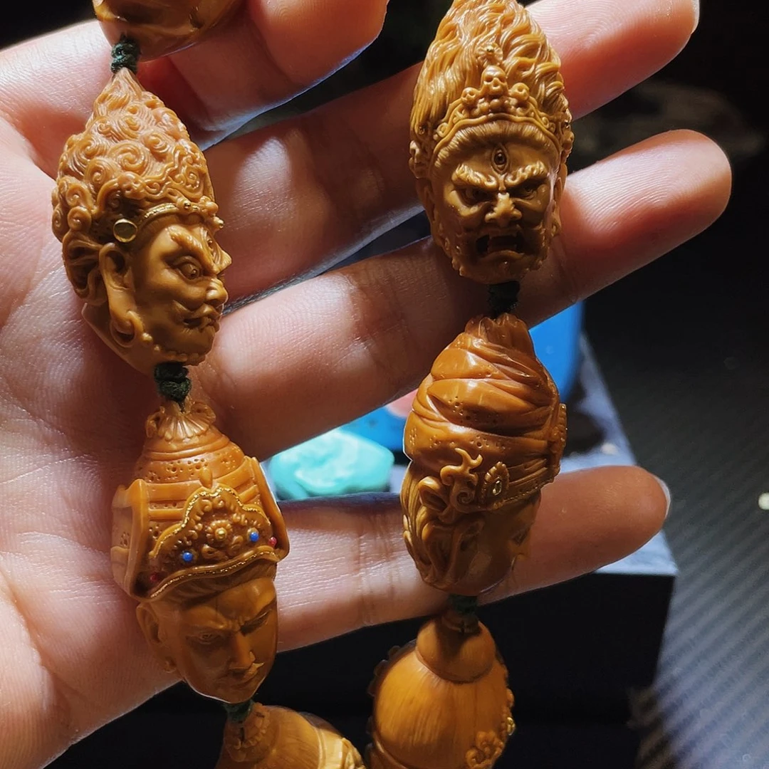 橄榄核吊坠裤****蟆橄榄核十三刀莲花生八变
