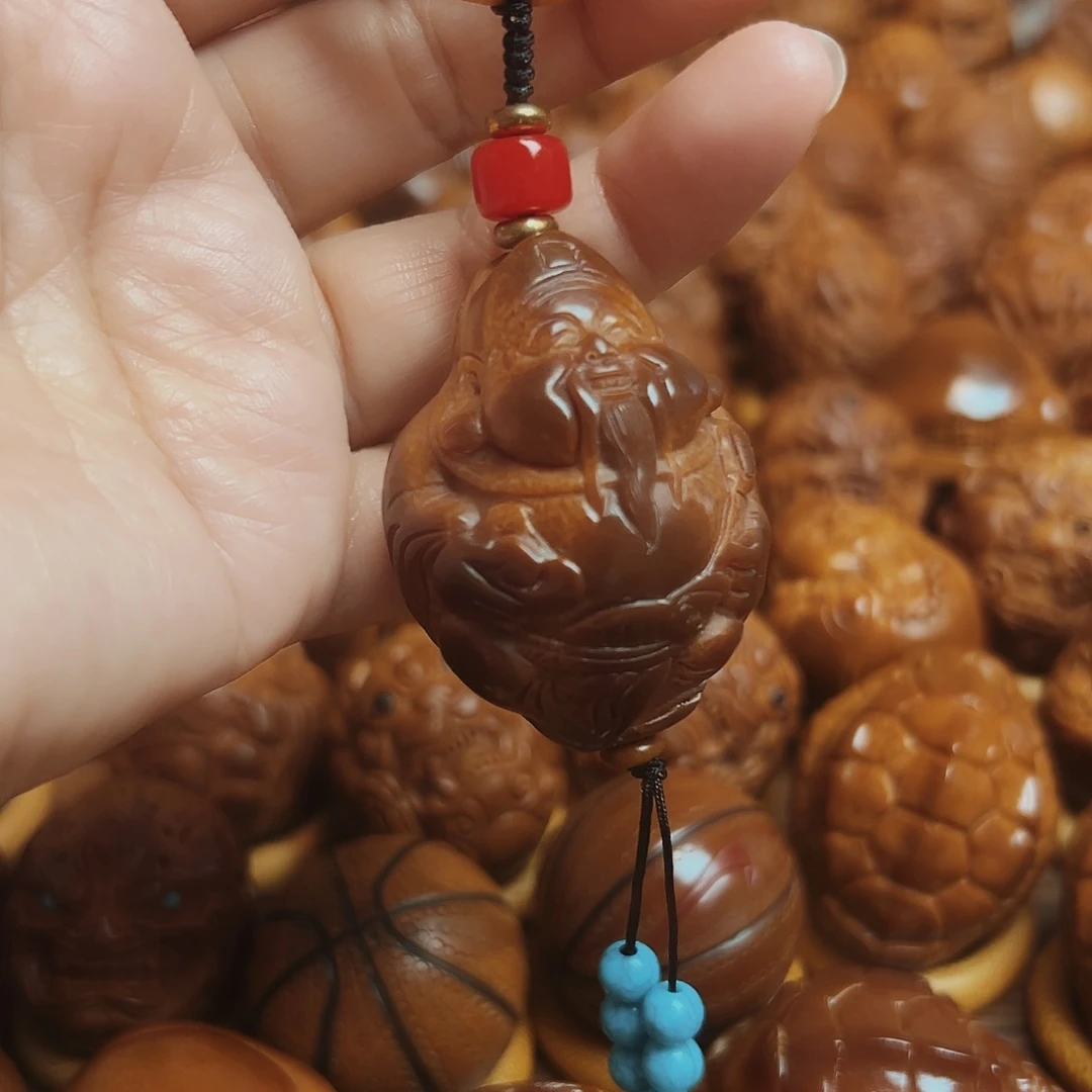 手串/手链橄榄核玉化财神手把件一颗