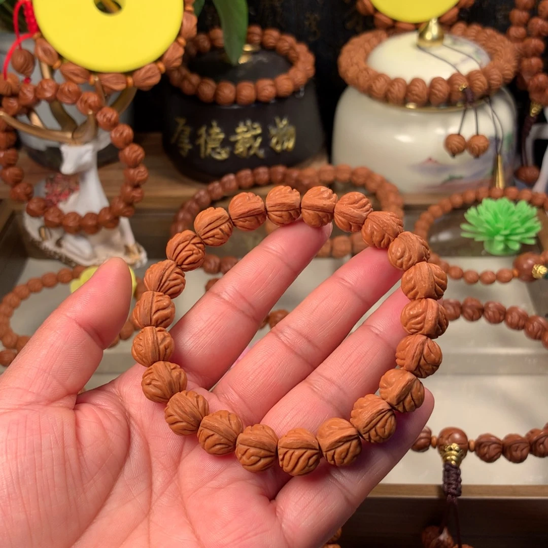 吊坠桃核小金豆手串