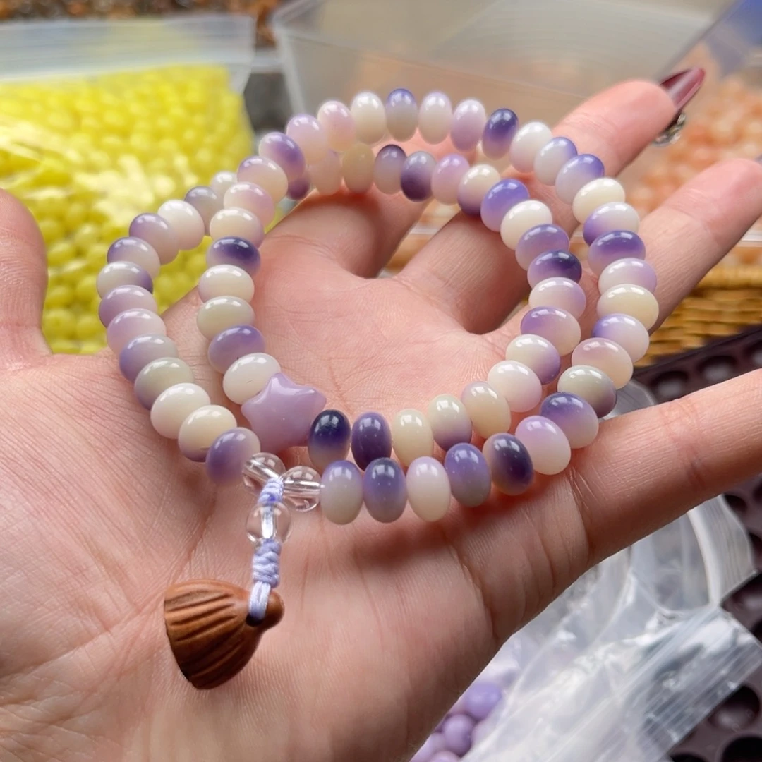 白玉菩提吊坠z9mm150颗。紫飘算盘