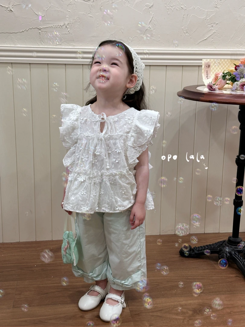 花布娃娃衫蝴蝶结九分裤