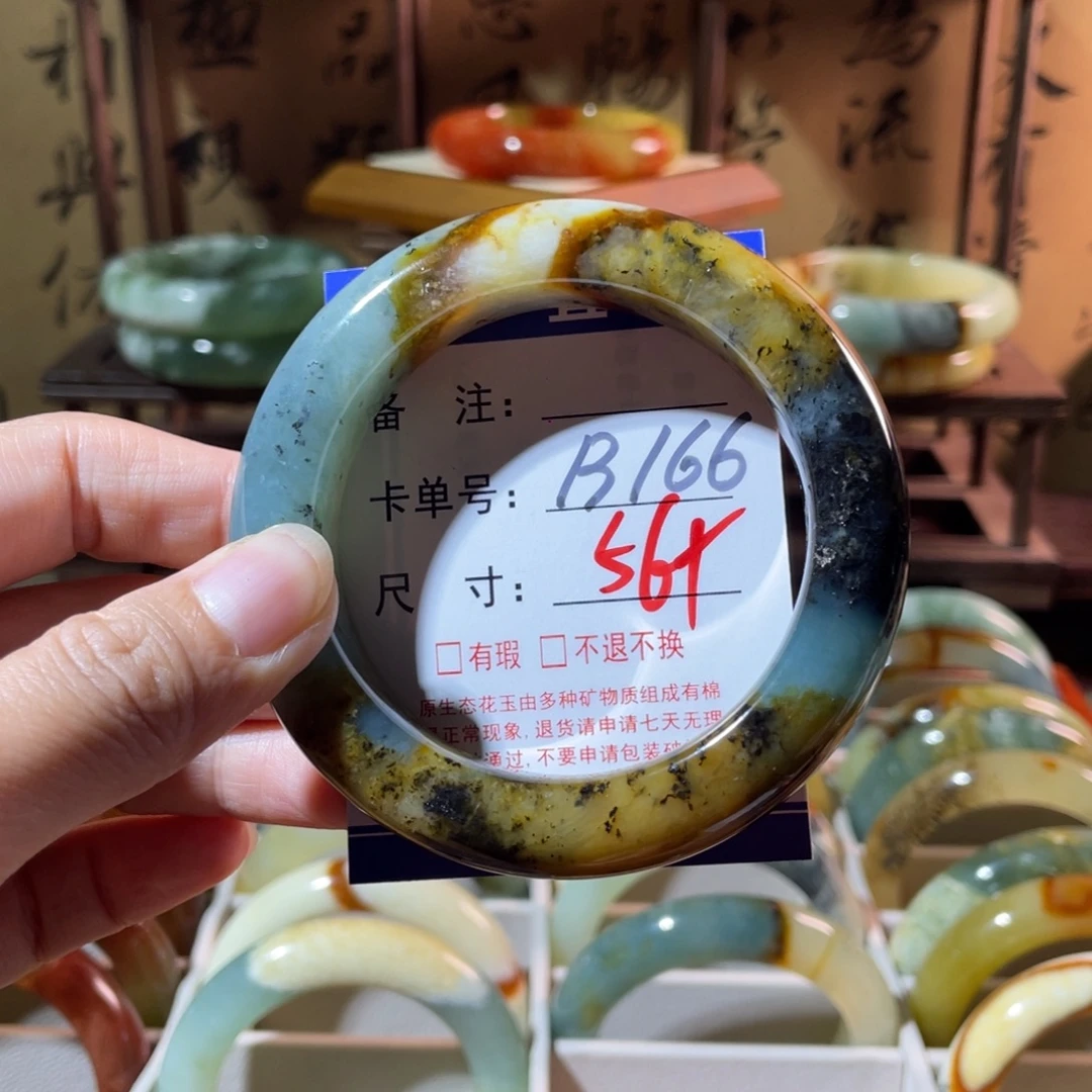 离***筝未镶嵌蛇纹石玉手镯