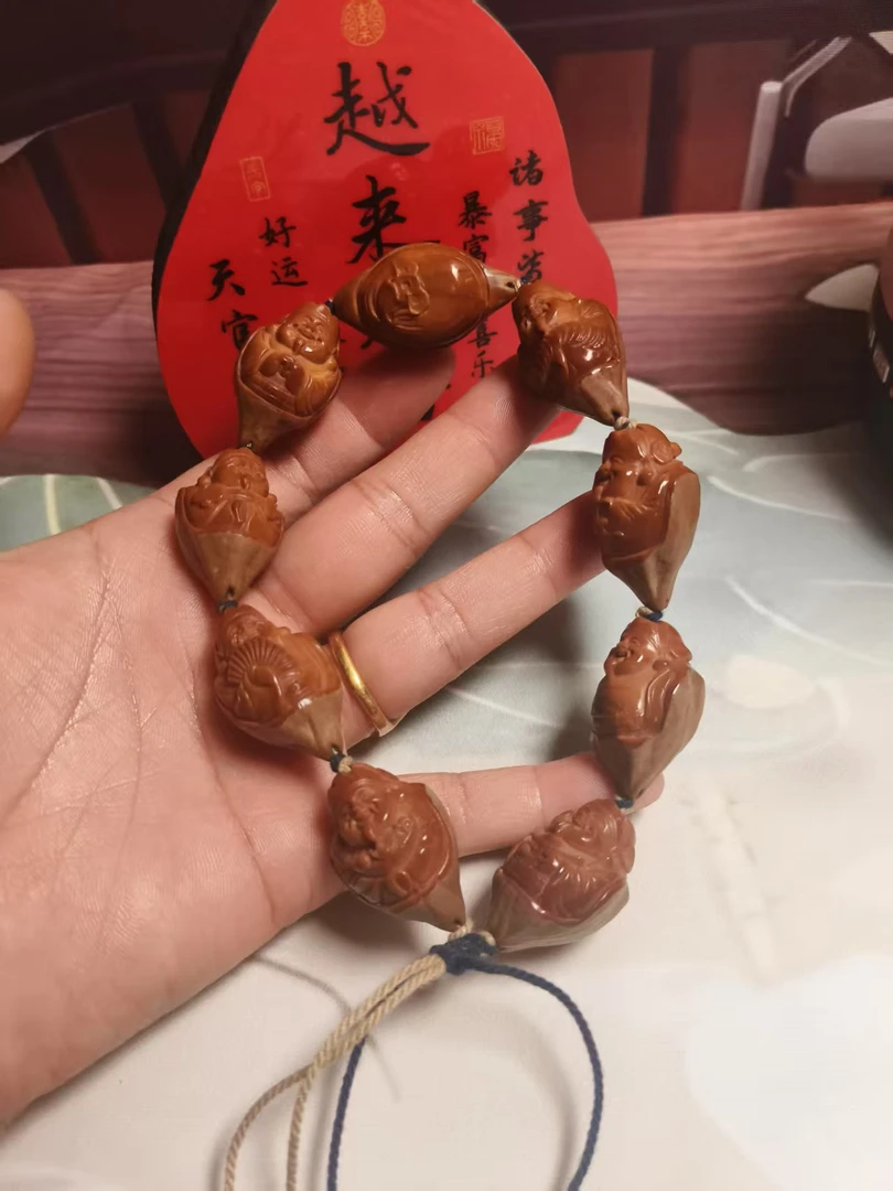 橄榄核百年树王包衣财神1.9