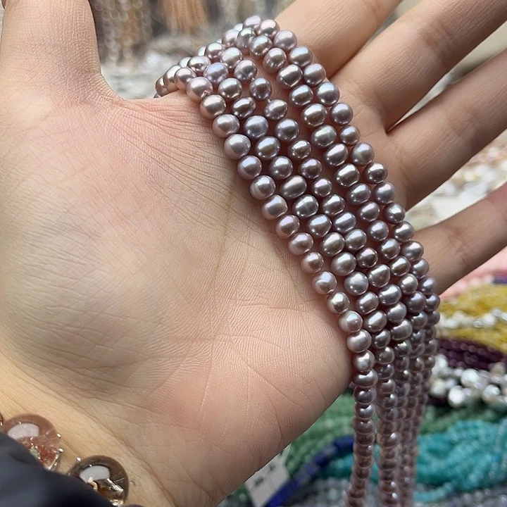 玛瑙/玉髓未镶嵌珠宝半成品一条5-6mm左右椭圆紫珍珠