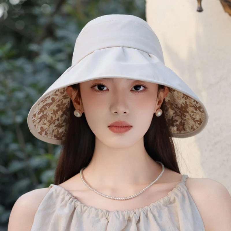 遮阳帽女夏季新款碎花蝴蝶结渔夫帽大檐遮阳休闲显脸小盆帽沙滩帽