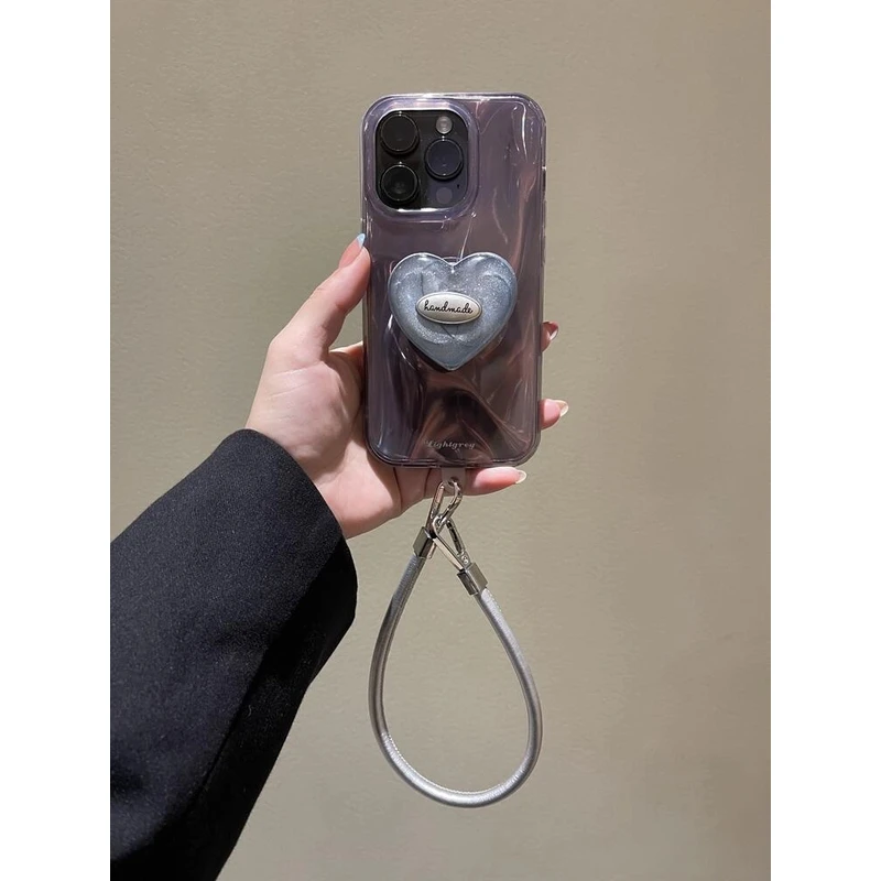 高级感镭射烟灰色爱心iPhone16pro手机壳苹果15promax手提绳14pro