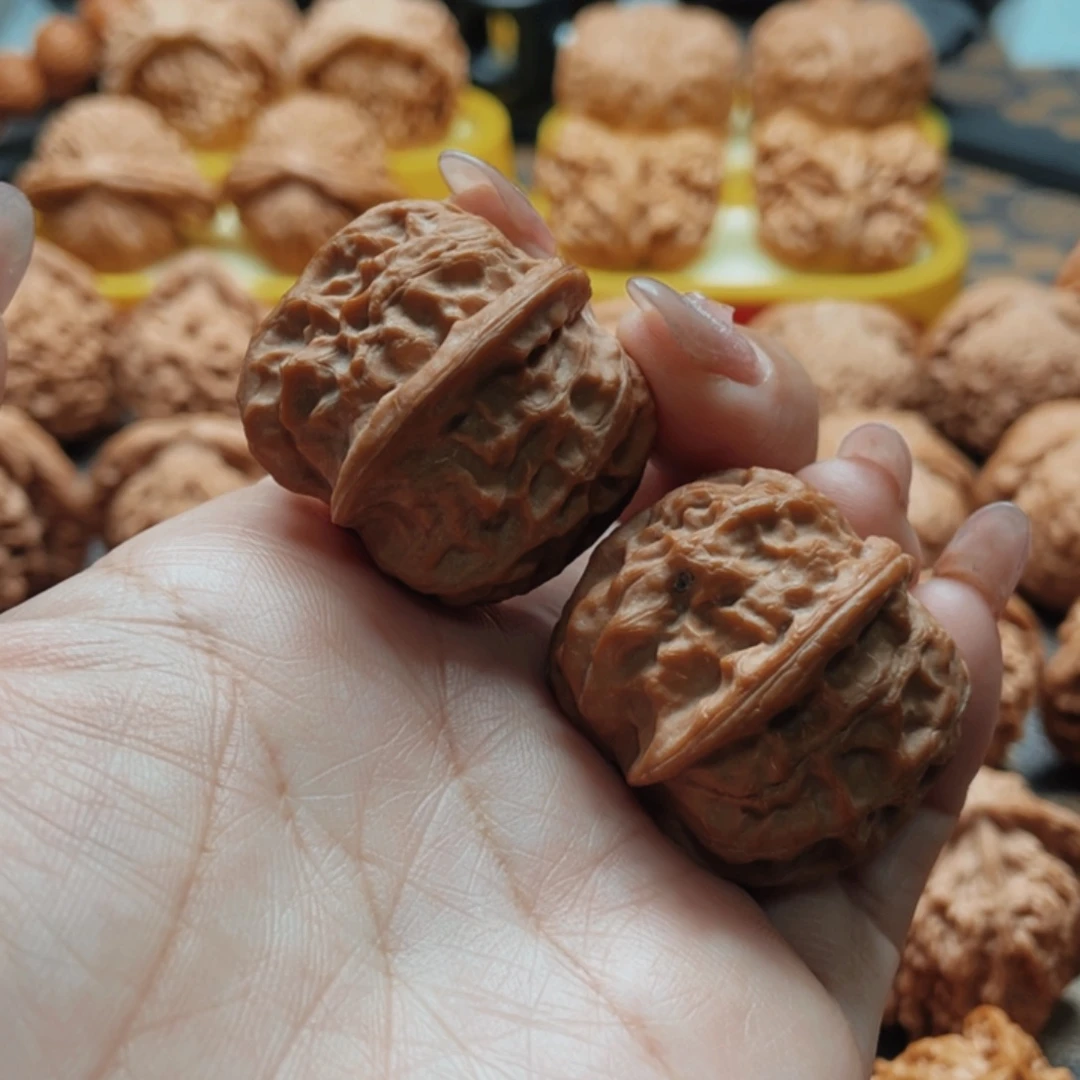 爱***油把件桃核龙眼元宝