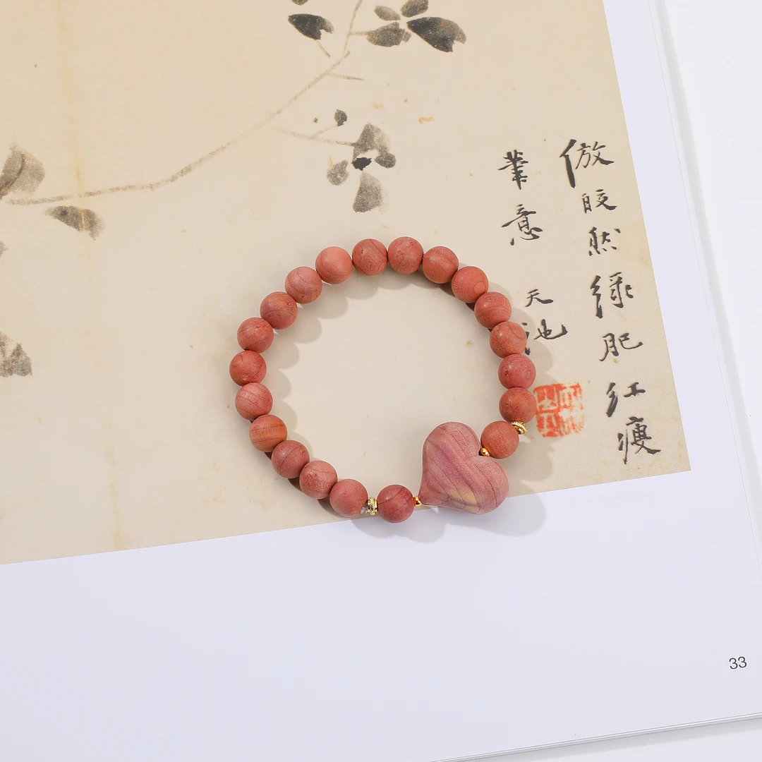 一了个卜【屁桃心心】血柏木桃手串