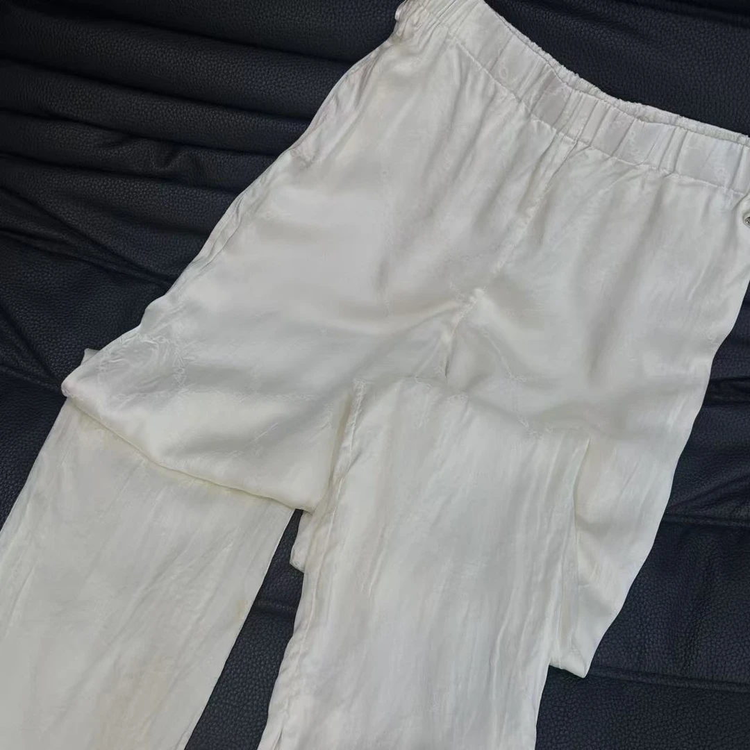 99新 Chanel/香奈儿 真丝暗纹满印logo杏色长裤 36码