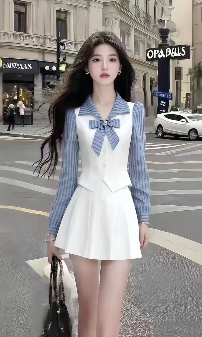 新款时尚温柔千金风条纹拼接长袖修身上衣+白色高腰半身裙女套装