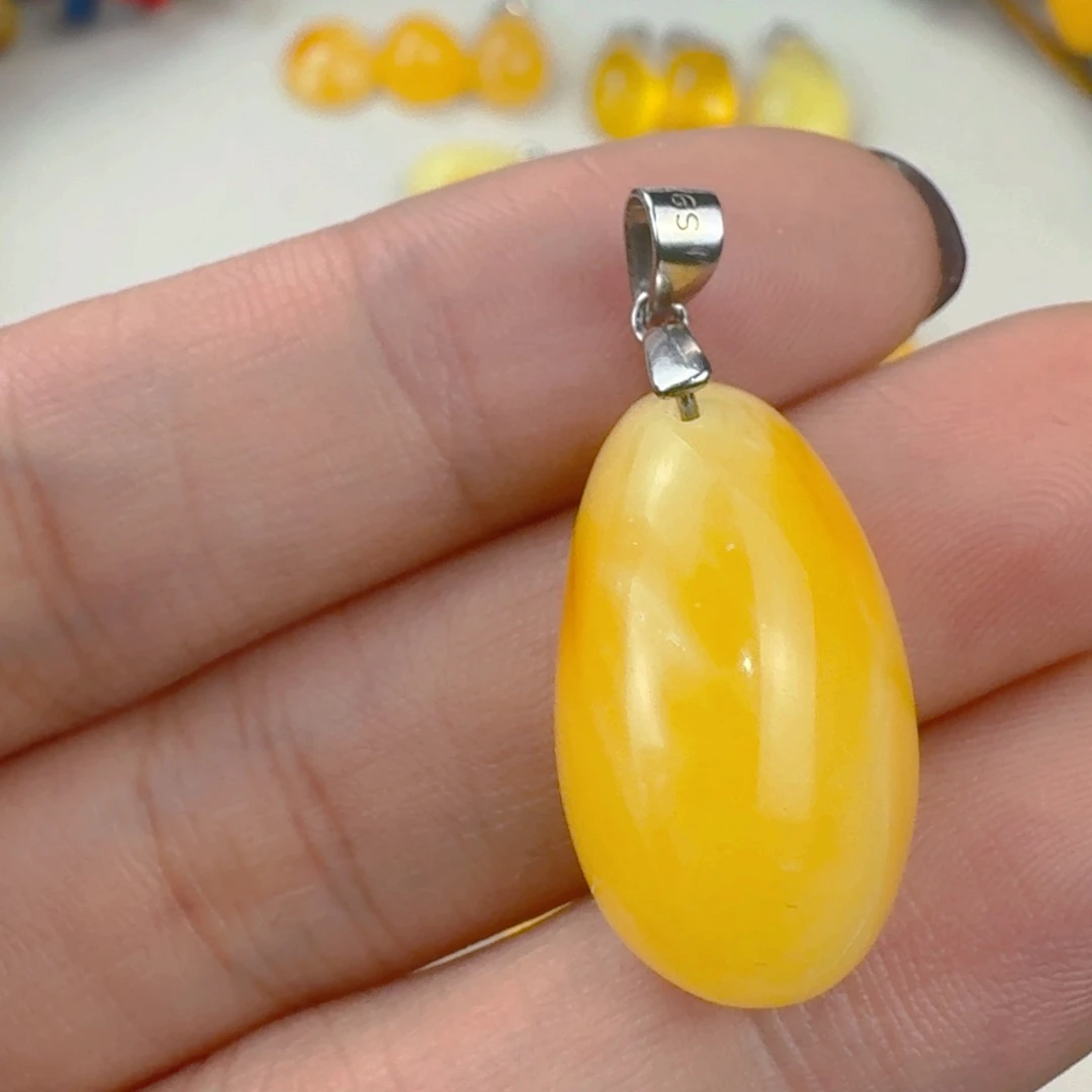 蜜蜡未镶嵌裸石全品 22×13.2×9.7mm