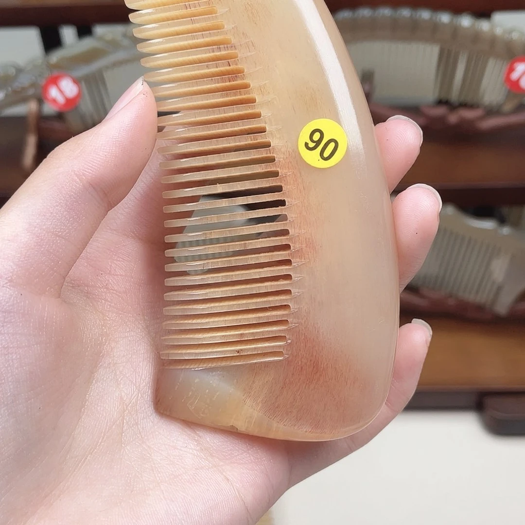 纯手工制作的牛角梳90用****8