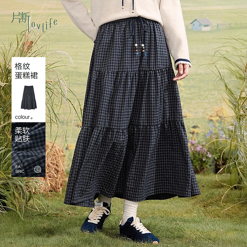 片断半身裙女2025冬季新款松紧腰休闲减龄格子裙文艺遮胯a字长裙