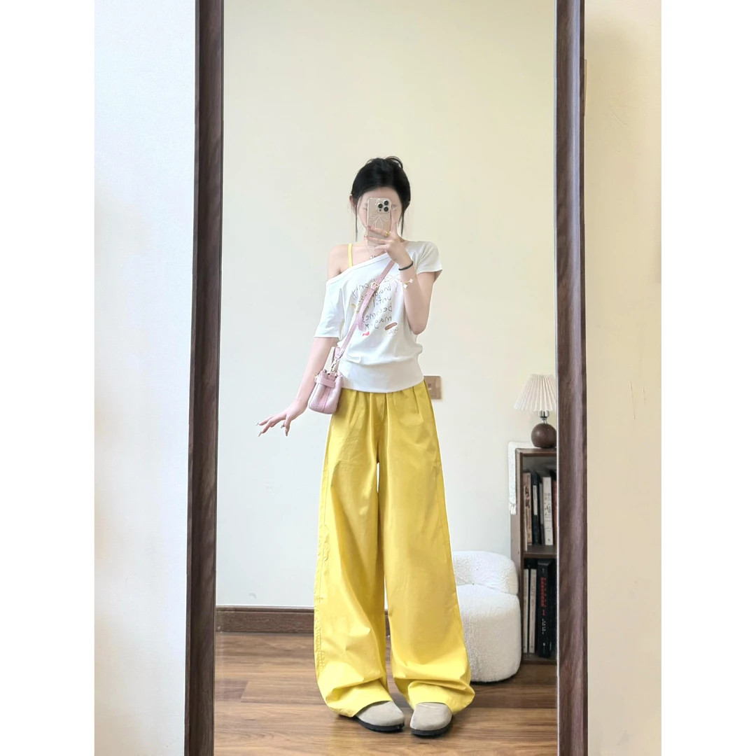 白色斜肩短袖夏季新款涂鸦白色t恤宽松显瘦露肩绝美上衣裤子套装