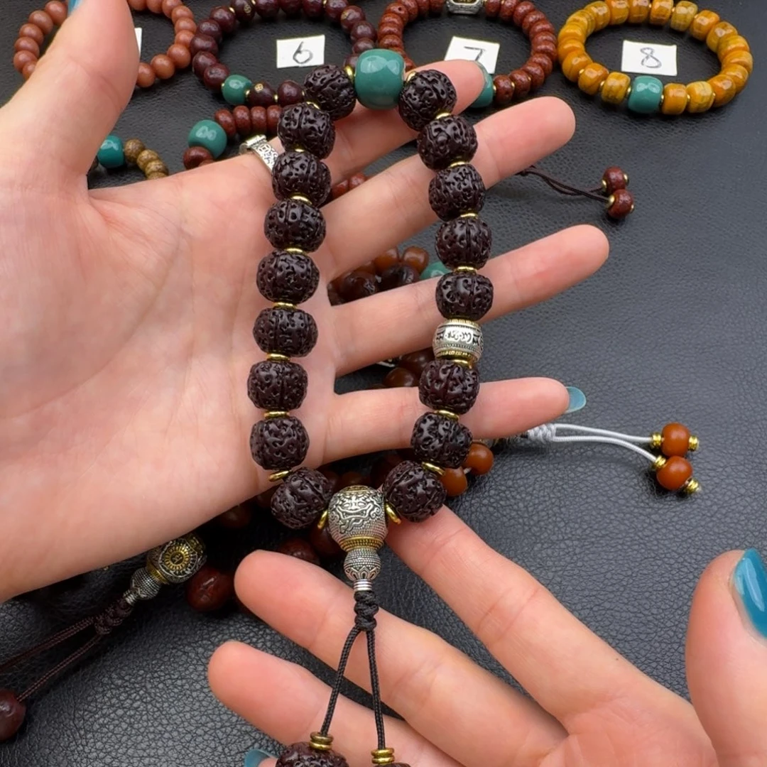 偌***水风车木（黑檀木）手持