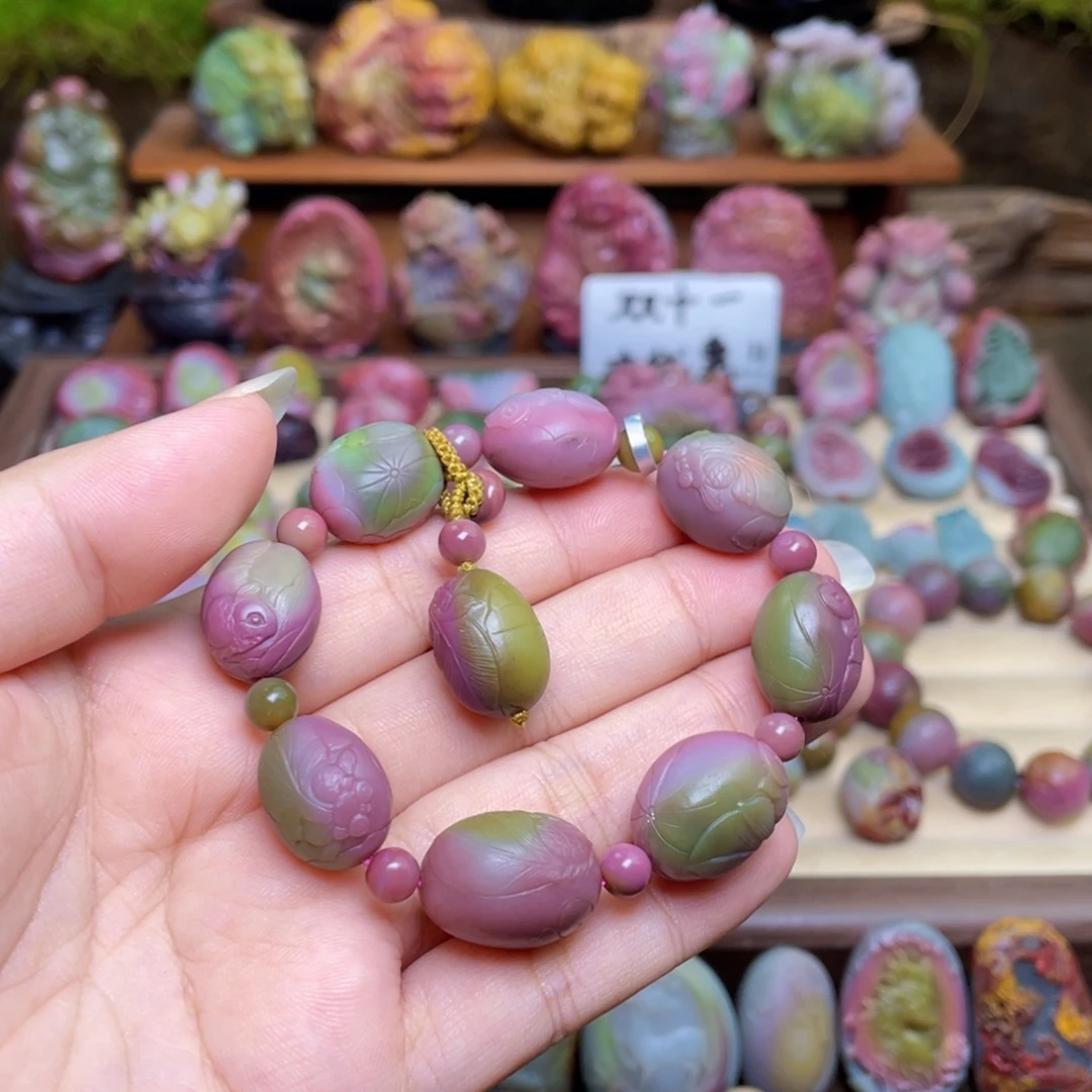 莲***水玛瑙/玉髓未镶嵌珠宝半成品盐源玛瑙苏工西瓜鱼