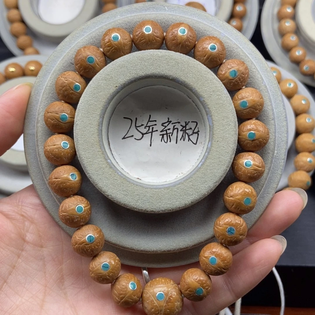 一***光手串凤眼菩提11.5➕松，25年籽