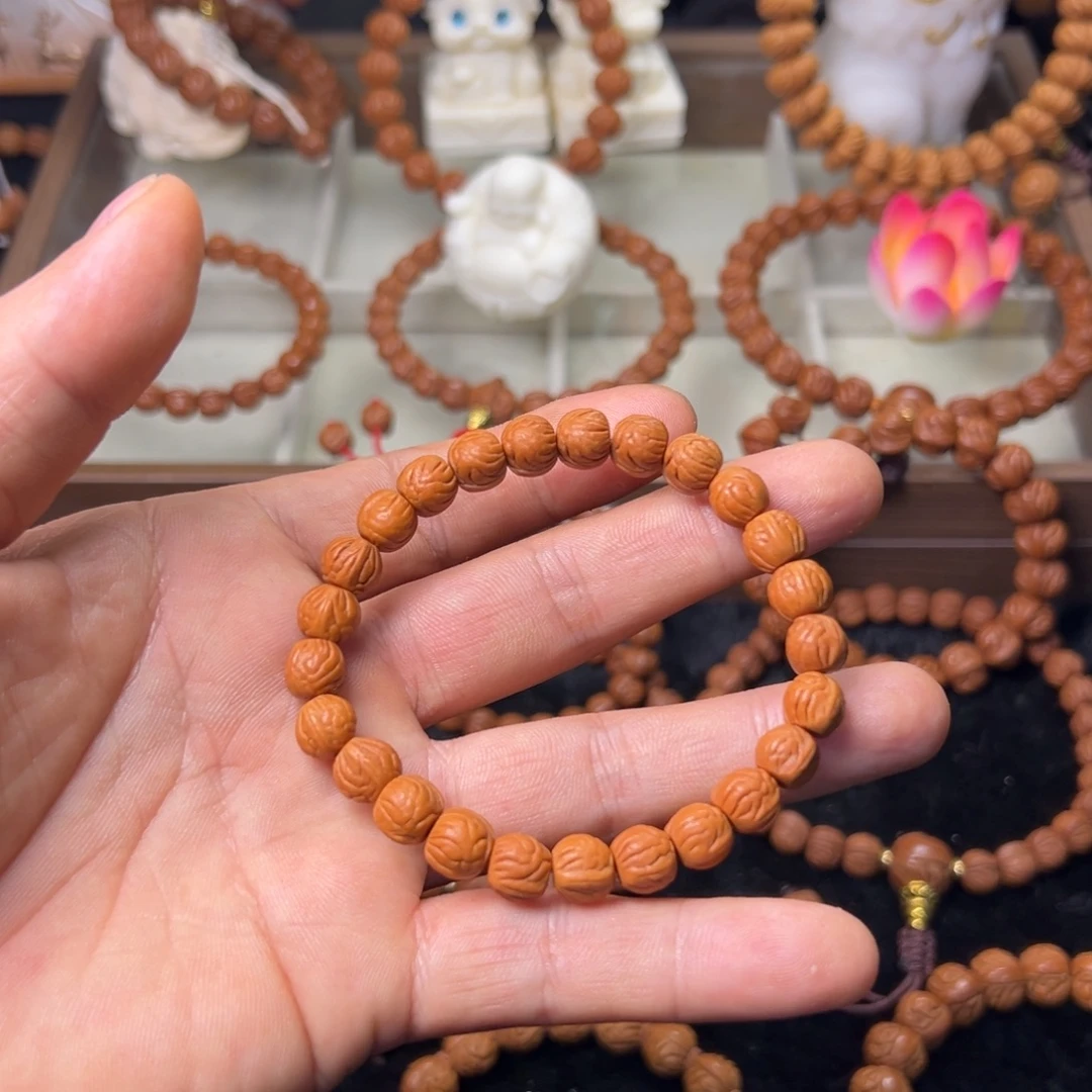 桃核吊坠9玉龙脊手串