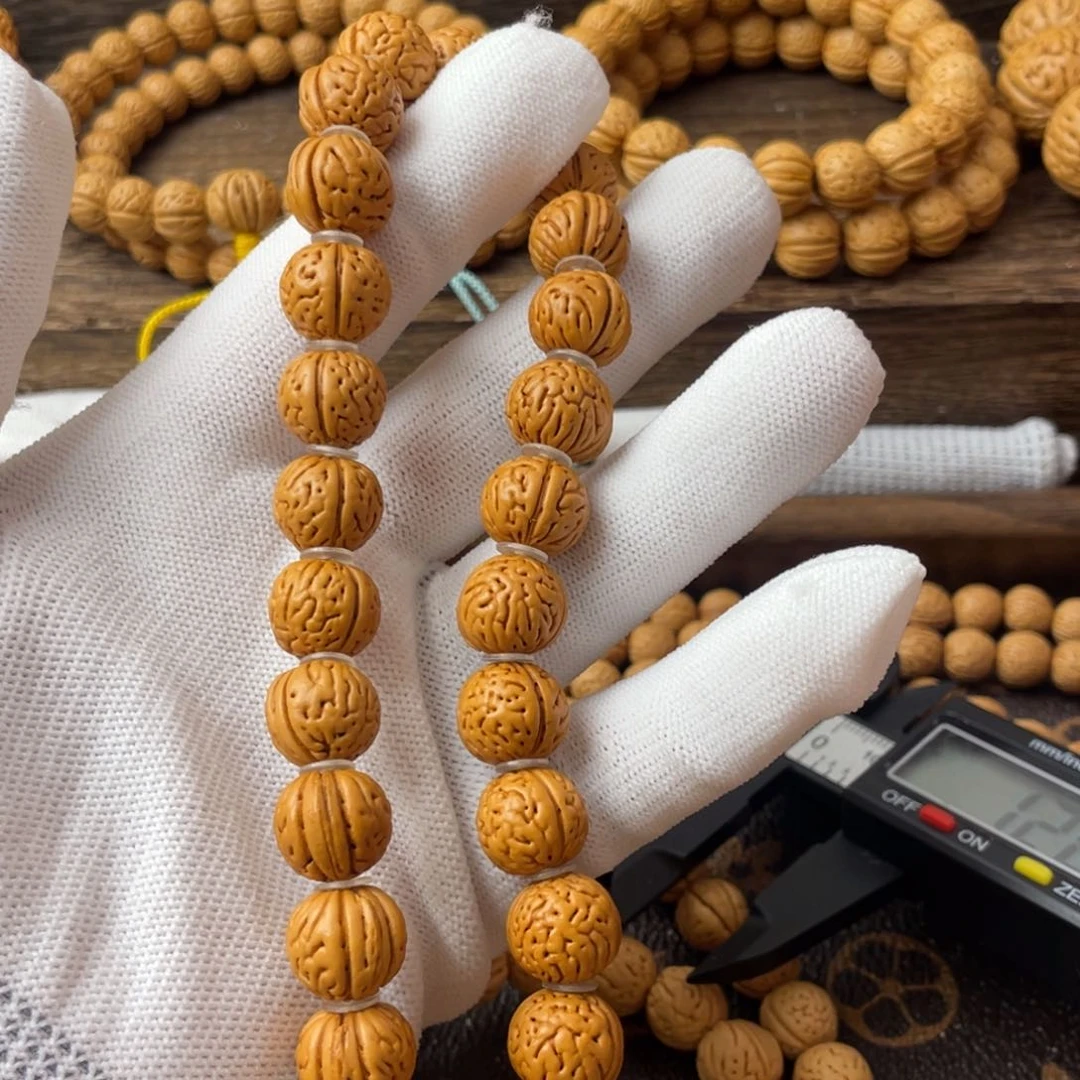 吊坠桃核A****》野生红魔小金豆