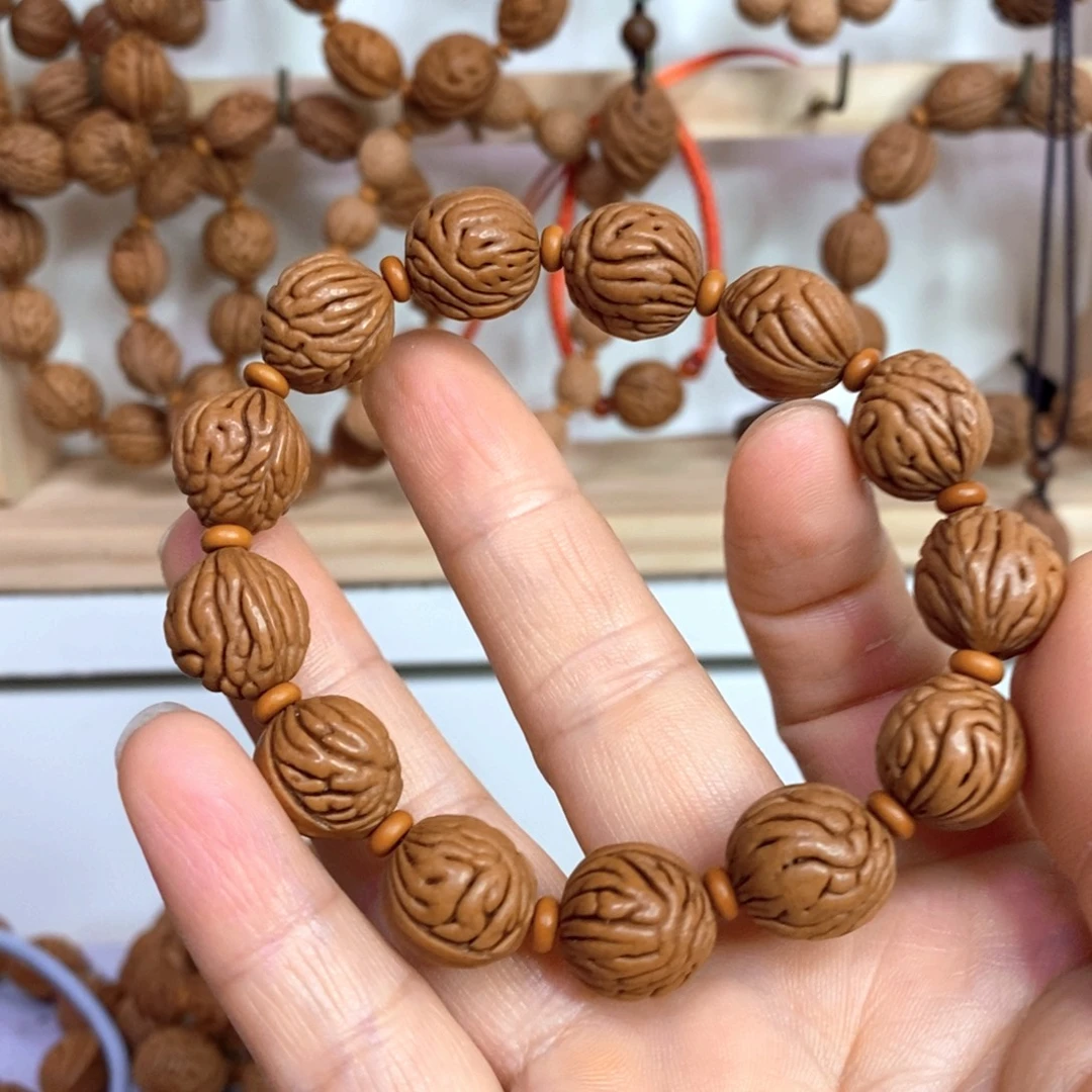 斯***玩手串桃核11111112221