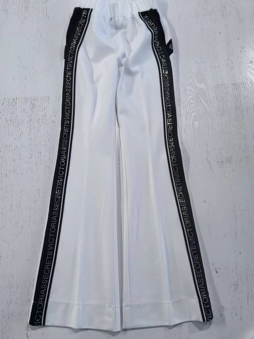 2025新款佳木斯健身操白色镶钻微喇修身时尚显瘦长裤