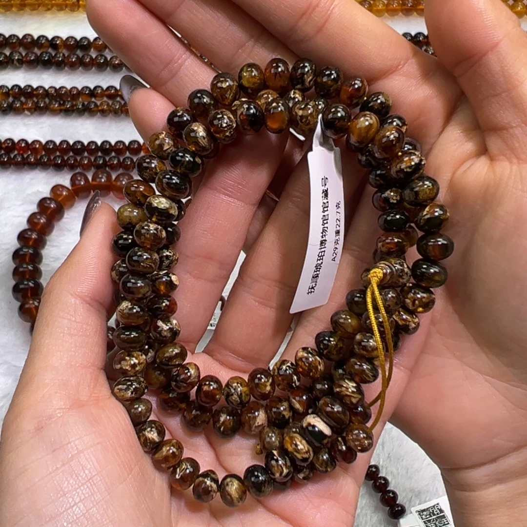 琥珀未镶嵌手串抚顺琥珀黑花蜡7m