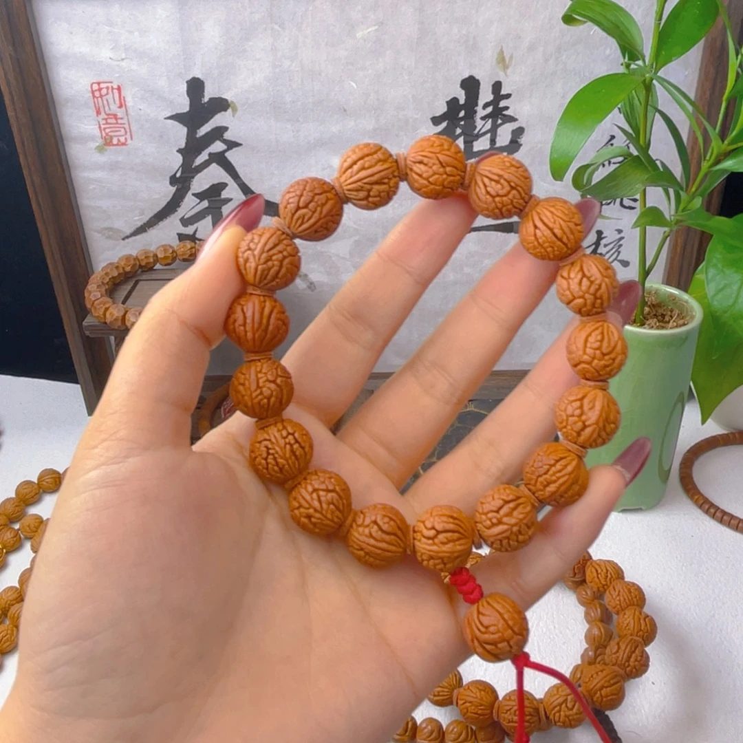 骑***海秦岭龙纹桃核手持