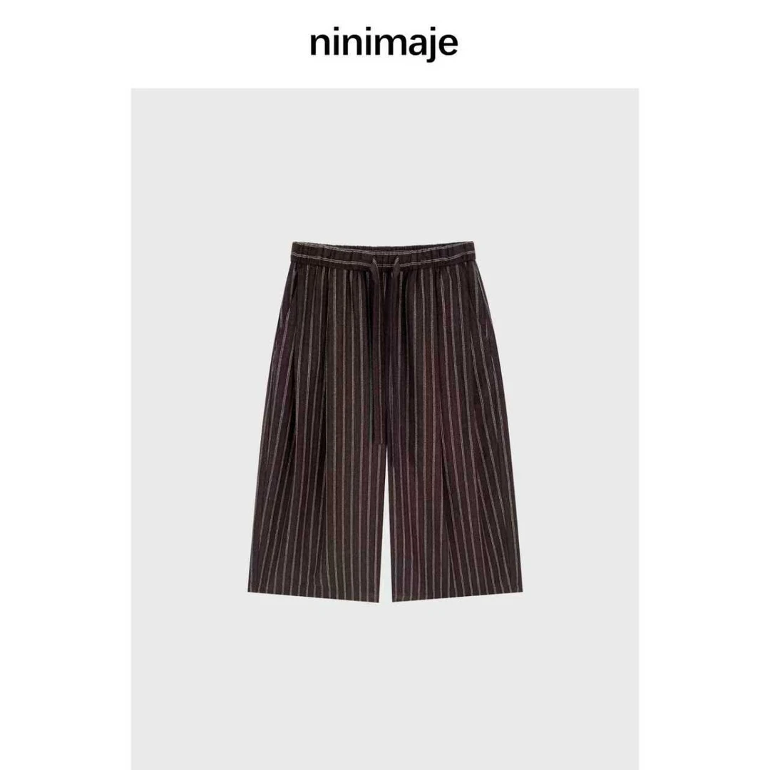 NanBeiBei  极简设计款高级调性抽绳肌理感竖条纹羊毛裤 6136