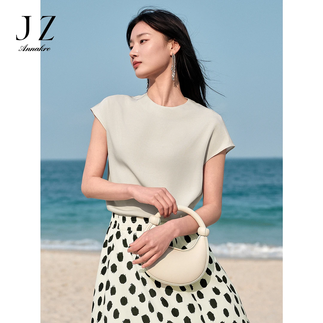 玖姿安娜蔻KWFX80403时尚极简优雅气质圆领宽松盖袖上衣女2025夏