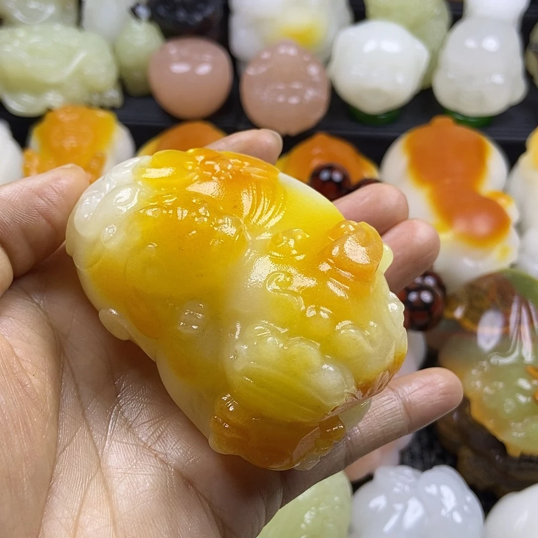 无花朵原石手把件