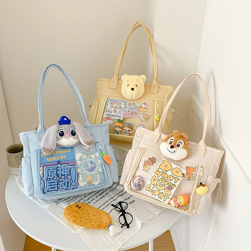卡通蓝色小兔帆布手提包2025新款大容量上班通勤包女可爱单肩包