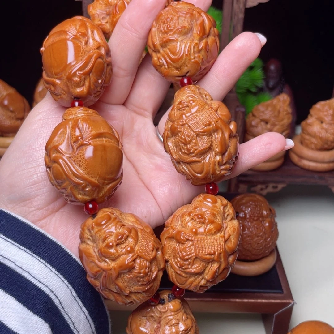 吊坠橄榄核龙财手持