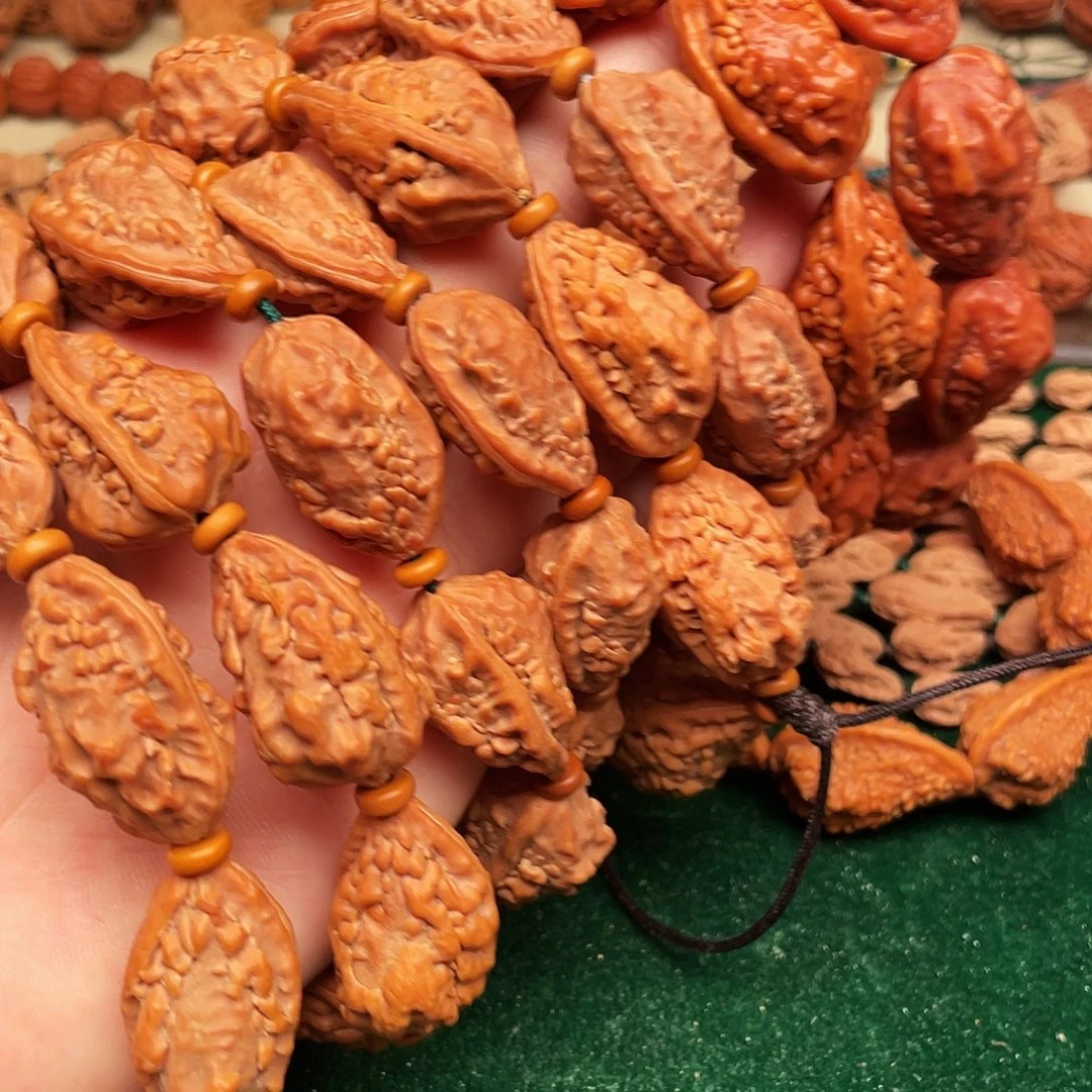 书***包文玩核桃吊坠麒麟