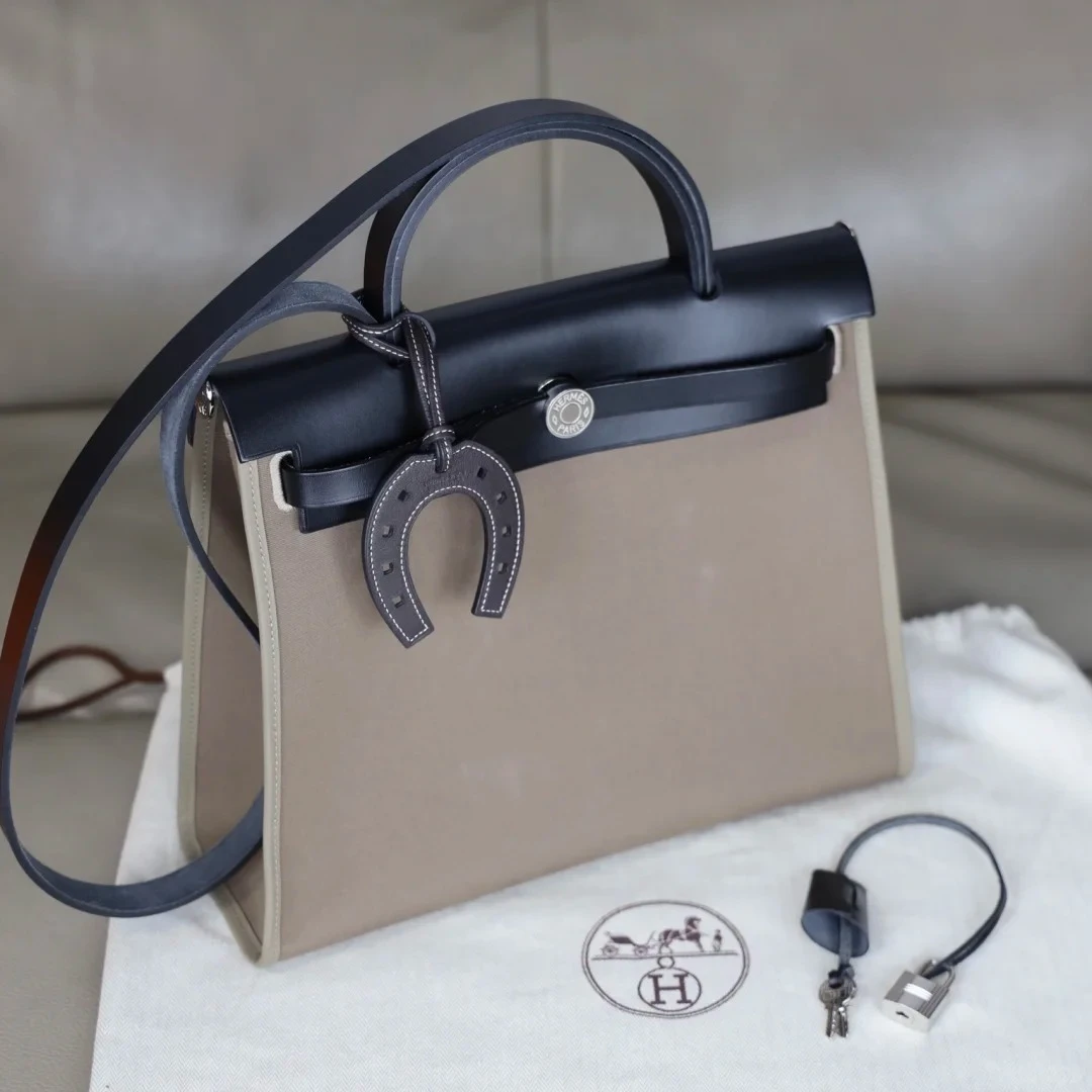 99新 Hermes/爱马仕 小花Jerry Herbag31 大象灰C刻银扣包