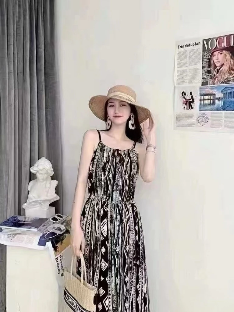 （不退换）1500190时尚印花度假风吊带连衣裙长款