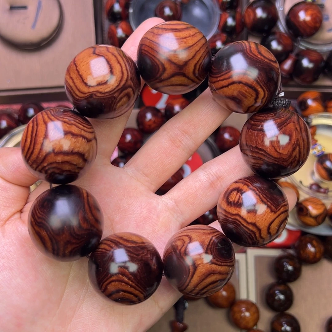 木质类黄花梨成品手串鬼脸对眼