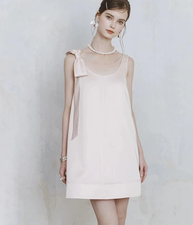 初恋千金风连衣裙2025夏季新款减龄气质蝴蝶结粉色吊带裙背心短裙