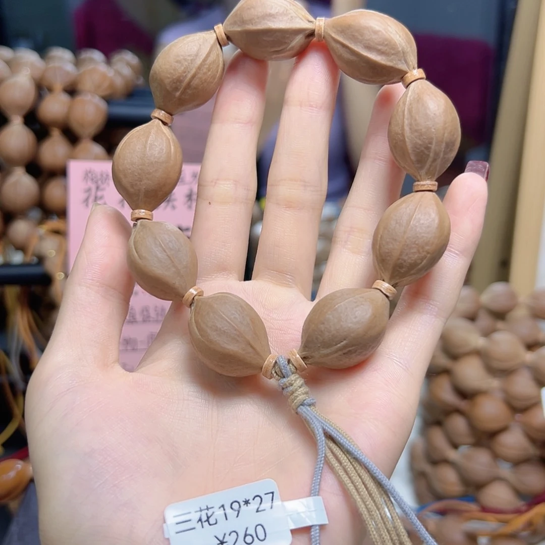 奇***程橄榄核手串/手链19*27三花