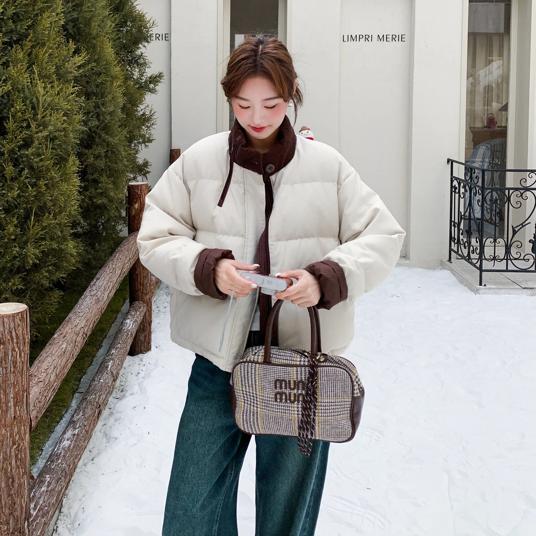 米白色撞色立领加厚羽绒服女2025冬季新款韩系减龄百搭白鸭绒外套