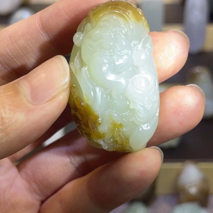 和田玉未镶嵌颈饰且末糖财神