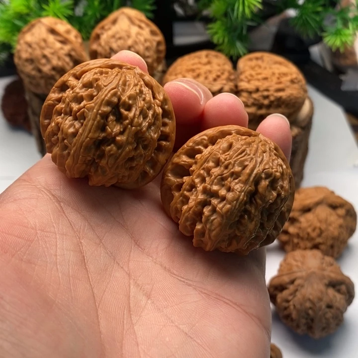 文玩核桃把件39球白