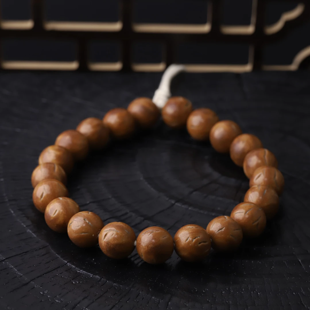 S8991【龙纹桃核】精品高抛光珠桃核手串文玩单圈