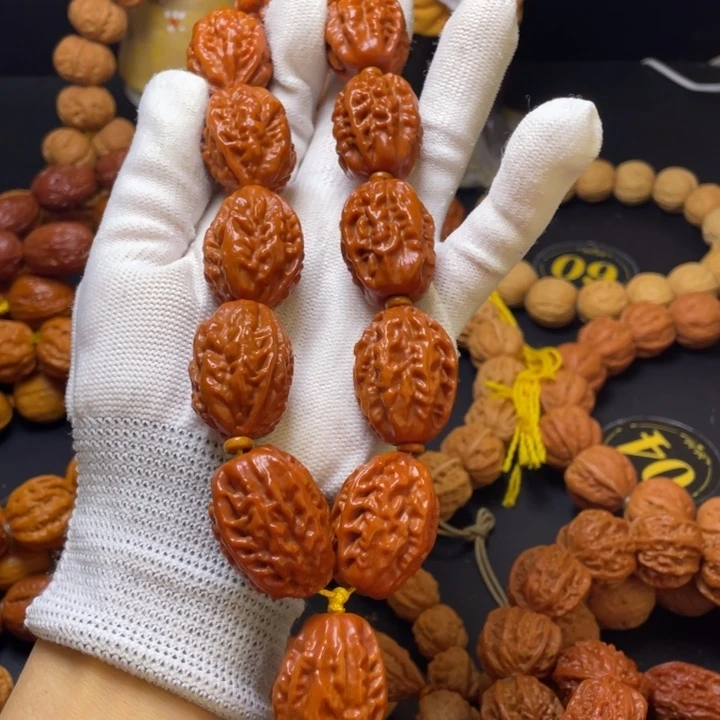 贰***天文玩核桃手串火麒麟