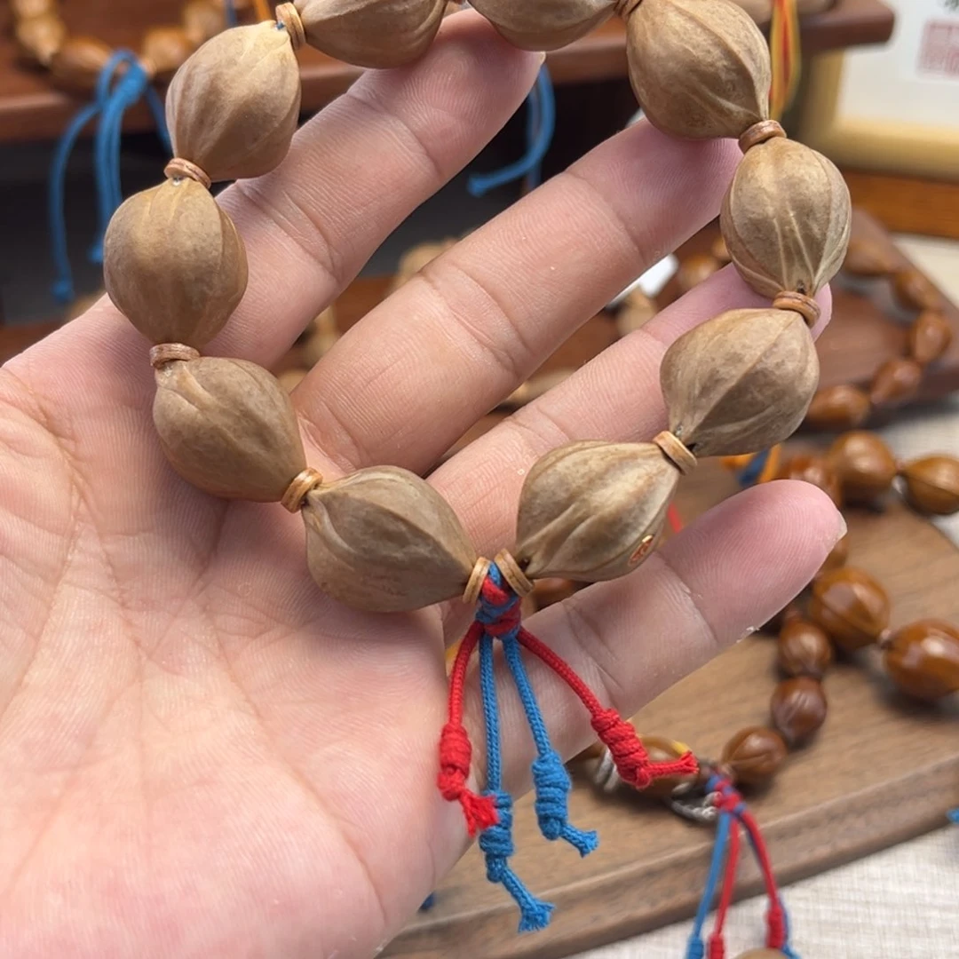 W***橄榄核手串四面佛