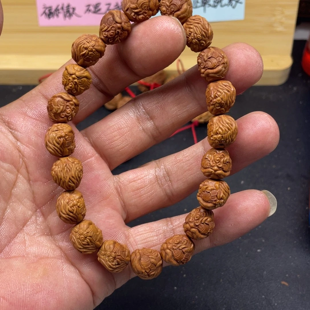 龙纹桃核醒狮微瑕