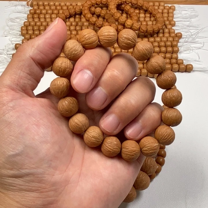 吊坠猴头核桃凤羽