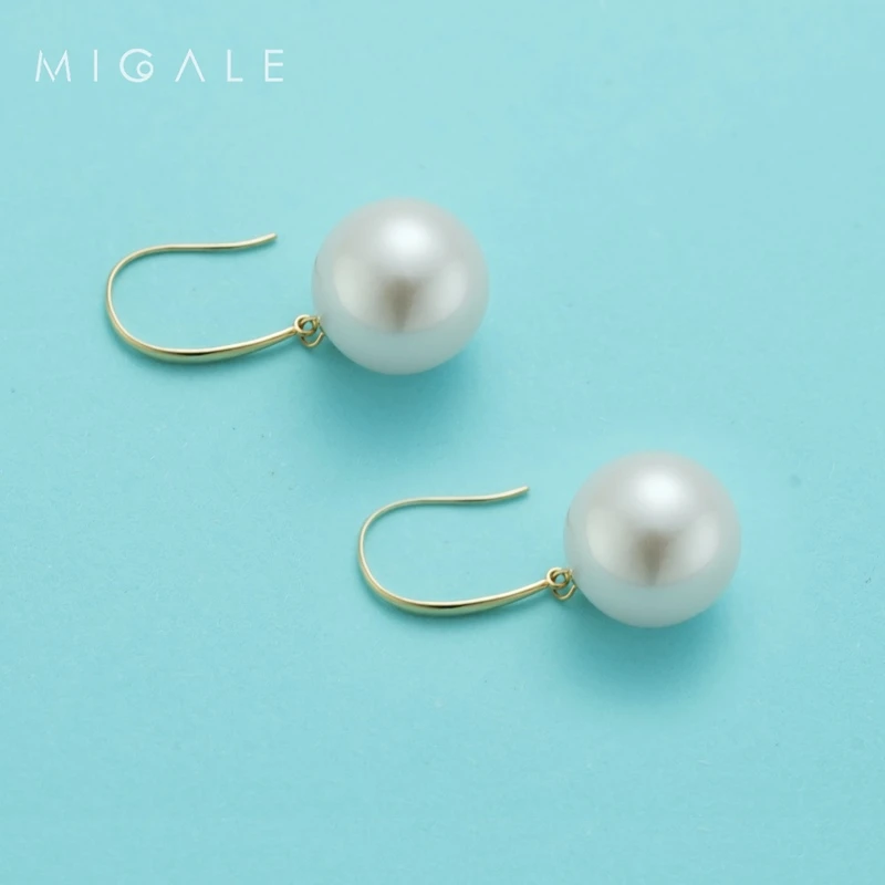 芈伽勒经典款白珍珠耳钩 10-11mm c940